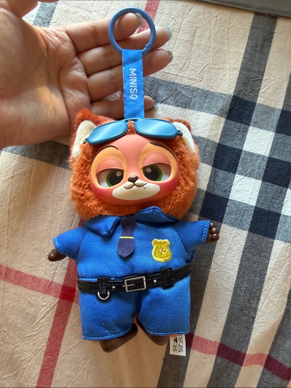 MINISO Orange Plush Cat Keychain with Blue Police Outfit